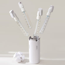 Load image into Gallery viewer, Cutie Quattro 4-In-1 Refillable Travel Dispenser